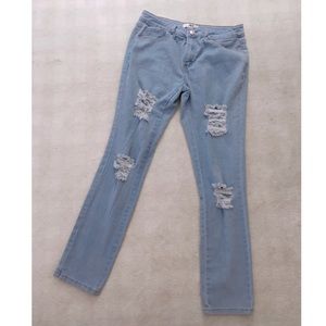 Light distressed blue jeans